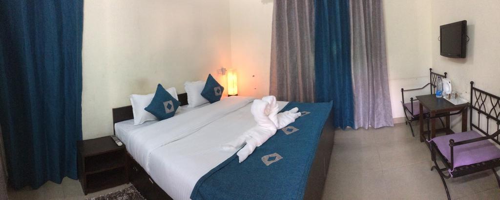 Hotel Sukhsadan Dehradun Habitación foto